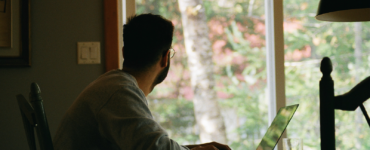 man looking at window remote employees